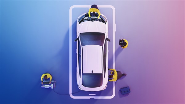 Bijelo Renault vozilo promatrano odozgo, dok serviseri obavljaju pregled i održavanje vozila.