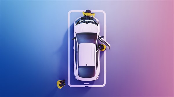 Bijelo Renault vozilo snimljeno odozgo tijekom servisiranja, uz dva servisna tehničara u žutoj radnoj odjeći.