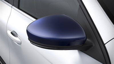 Plavi poklopac bočnog retrovizora na vozilu Megane Conquest full hybrid E-Tech.

