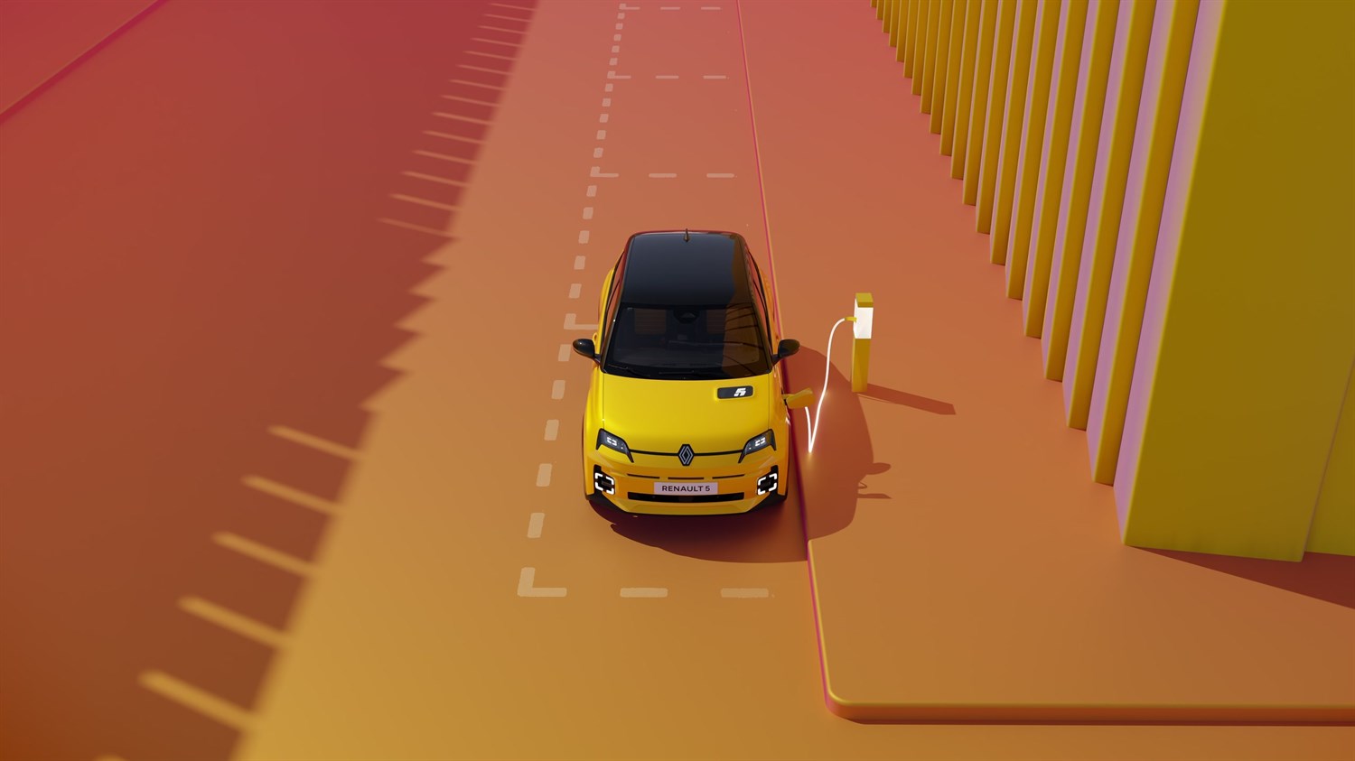 žuto vozilo Renault 5 parkirano uz cestu dok je priključeno na punionicu za električna vozila u modernom urbanom okruženju