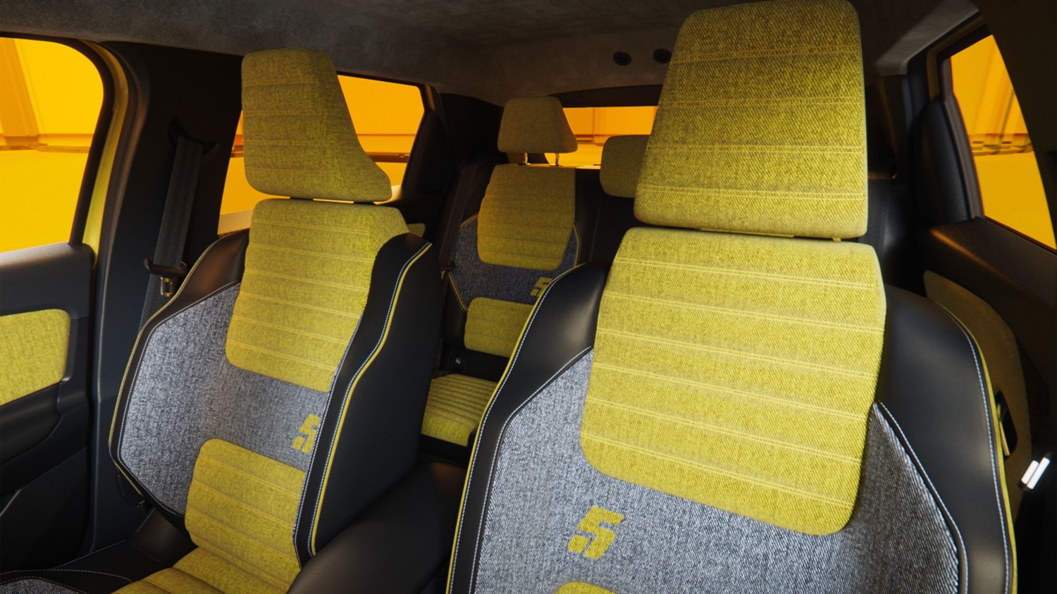 Unutrašnjost Renault 5 s prednjim i stražnjim sjedalima u žuto-sivoj tkanini s brojem 5.