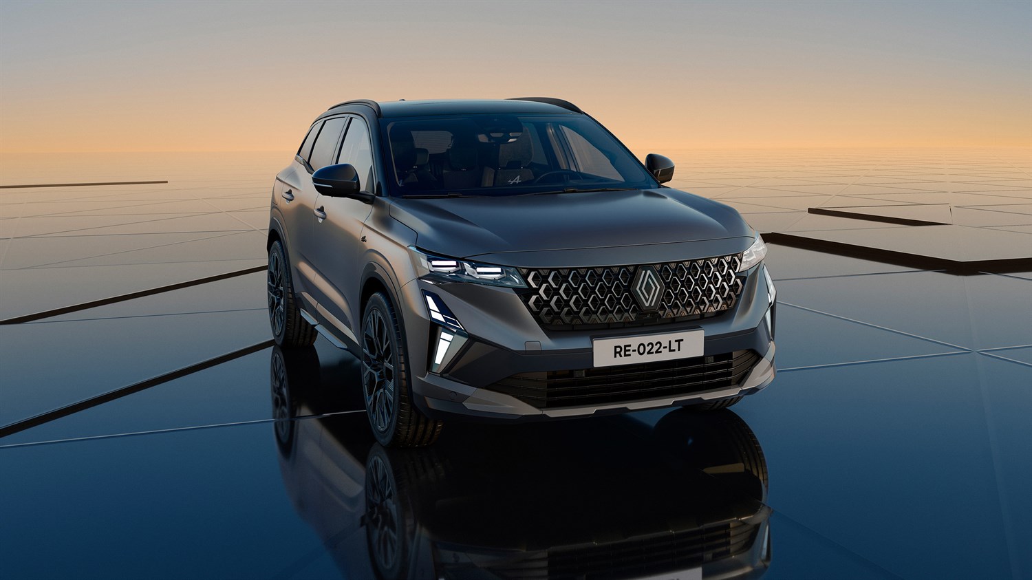 Vozilo Renault Austral full hybrid E-Tech fotografirano sprijeda, uz zalazak sunca u pozadini.








