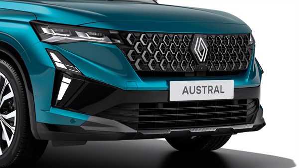 Prednji dio vozila Renault Austral full hybrid E-Tech u plavoj boji, s istaknutom rešetkom i prednjim svjetlima.

