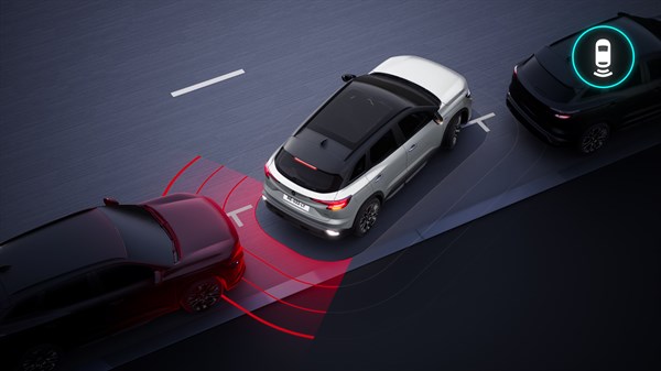 Renault Austral full hybrid E-Tech u vožnji unatrag s aktiviranim stražnjim senzorima i vizualnim upozorenjem.