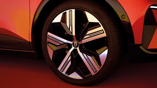 detalj kotača s 20-inčnim naplatkom na vozilu Renault Megane E-Tech electric u crvenoj boji