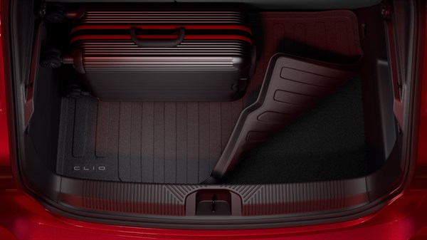 Prtljažnik vozila Renault Clio prikazan odozgo, s obostranom zaštitom prtljažnika i koferom, uz vidljive visoke rubove zaštitne podloge.