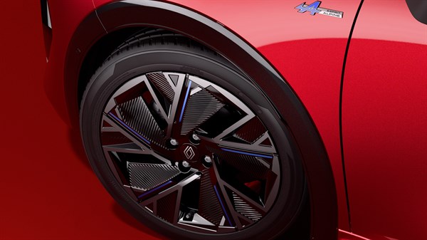 Detalj aluminijskog naplatka od 18 inča na vozilu Renault Clio, s plavim akcentima i sportskim dizajnom.