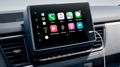 Zaslon u vozilu Trafic Passenger prikazuje sučelje Apple CarPlay s aplikacijama i bežičnim zrcaljenjem telefona.









