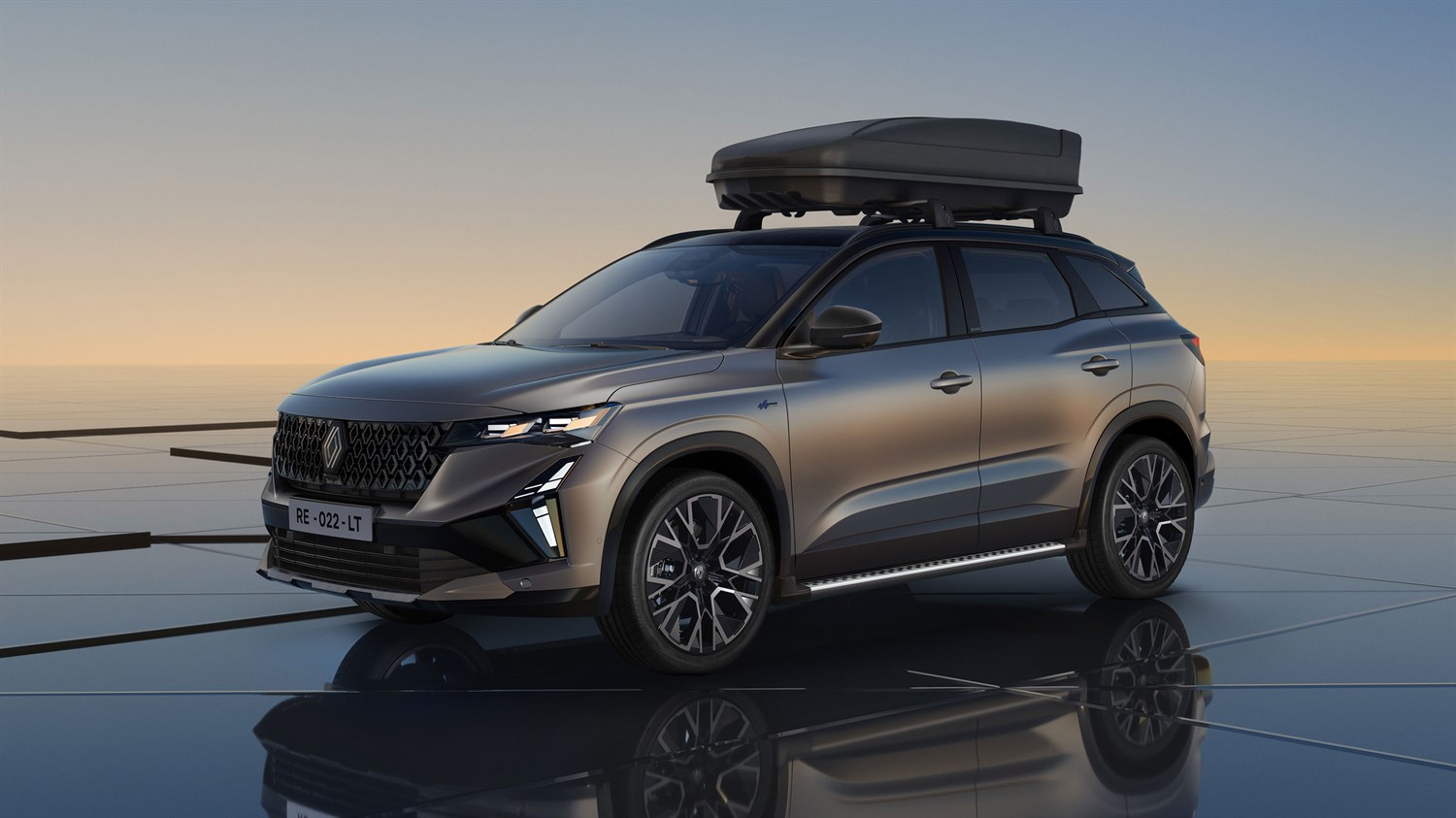 Vozilo Renault Austral full hybrid E-Tech fotografirano sprijeda, uz zalazak sunca u pozadini.








