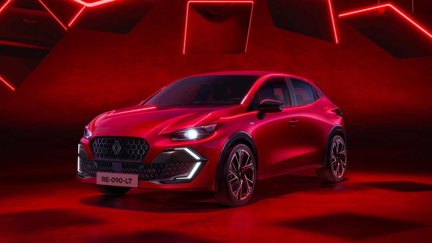 Crveni Renault Clio E-Tech electric na crvenoj površini.








