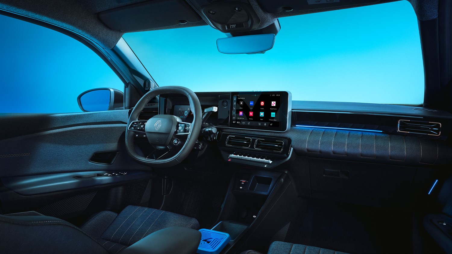 Unutrašnjost Renault 4 E-Tech electric vozila s digitalnom instrument pločom i središnjim zaslonom