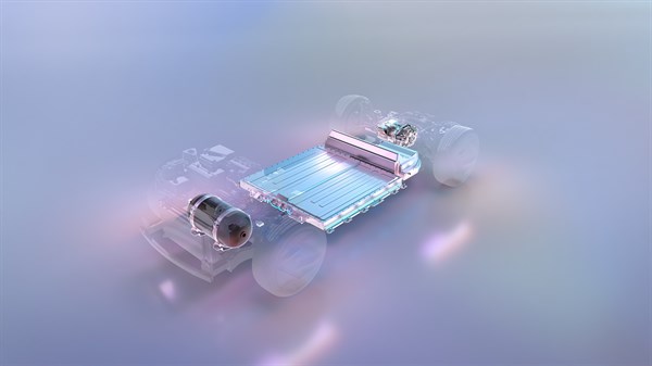 Prikaz baterijskog paketa i električnih komponenti vozila na svijetloj, maglovitoj pozadini.